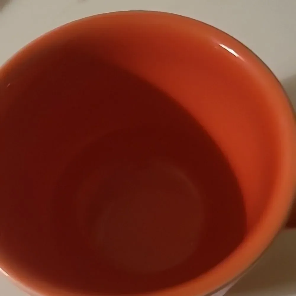 Fiestaware Orange Cup and Saucer Set